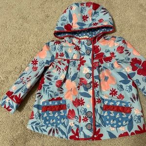 Matilda Jane raincoat. Buttons and zipper. This jacket is adorable and durable.